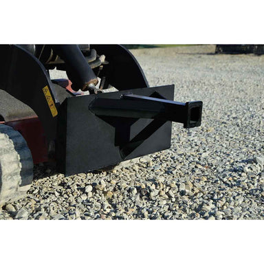 Black loflin reese hitch adapter on a gravel surface