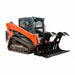 Orange and black compact track loader with a loflin root grapple attached on a white background