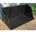 Large black loflin fabrication turkey litter bucket attachment on a dirt surface with grass in the background