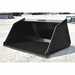 Large black loflin mini snow and litter bucket on a gravel surface.