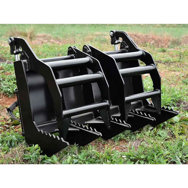 Black Loflin mini skid steer vertical root grapple on a grassy field
