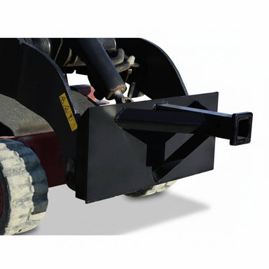 Close-up of a black loflin mini skid steer reese hitch adapter tool on a white background