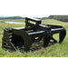 Black loflin skid steer rock grapple on grass with a scenic background