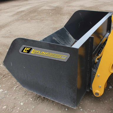 Black loflin fabrication trash bucket with Loflin Fabrication LLC logo on a construction site.