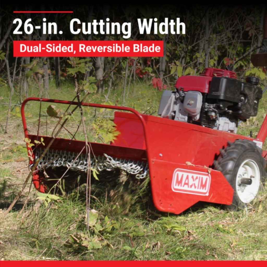 Red maxim 26 inch brush cutter with dual-sided, reversible blade on a grassy area
