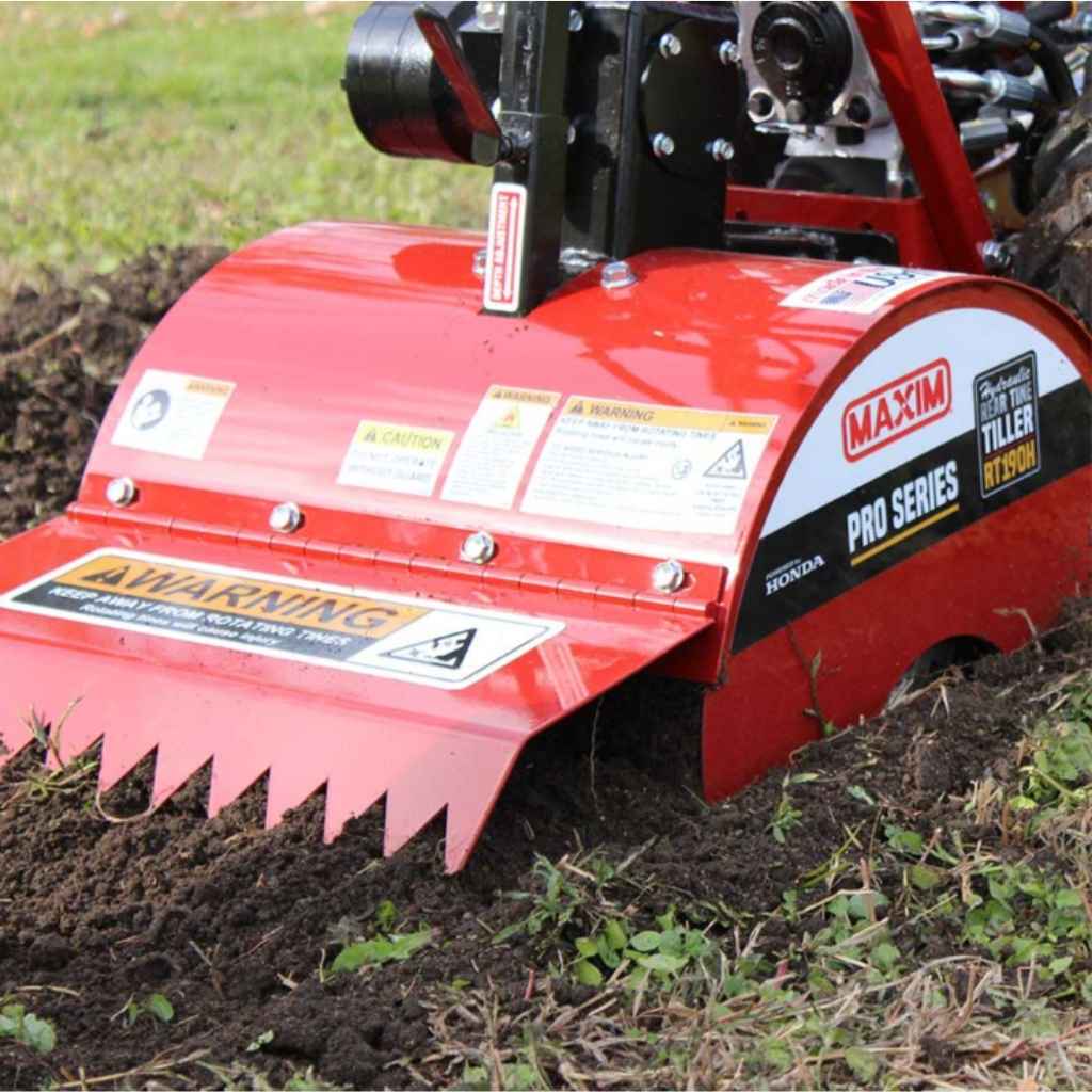Red maxim rt190h tiller with 'Maxim' branding on a grassy background