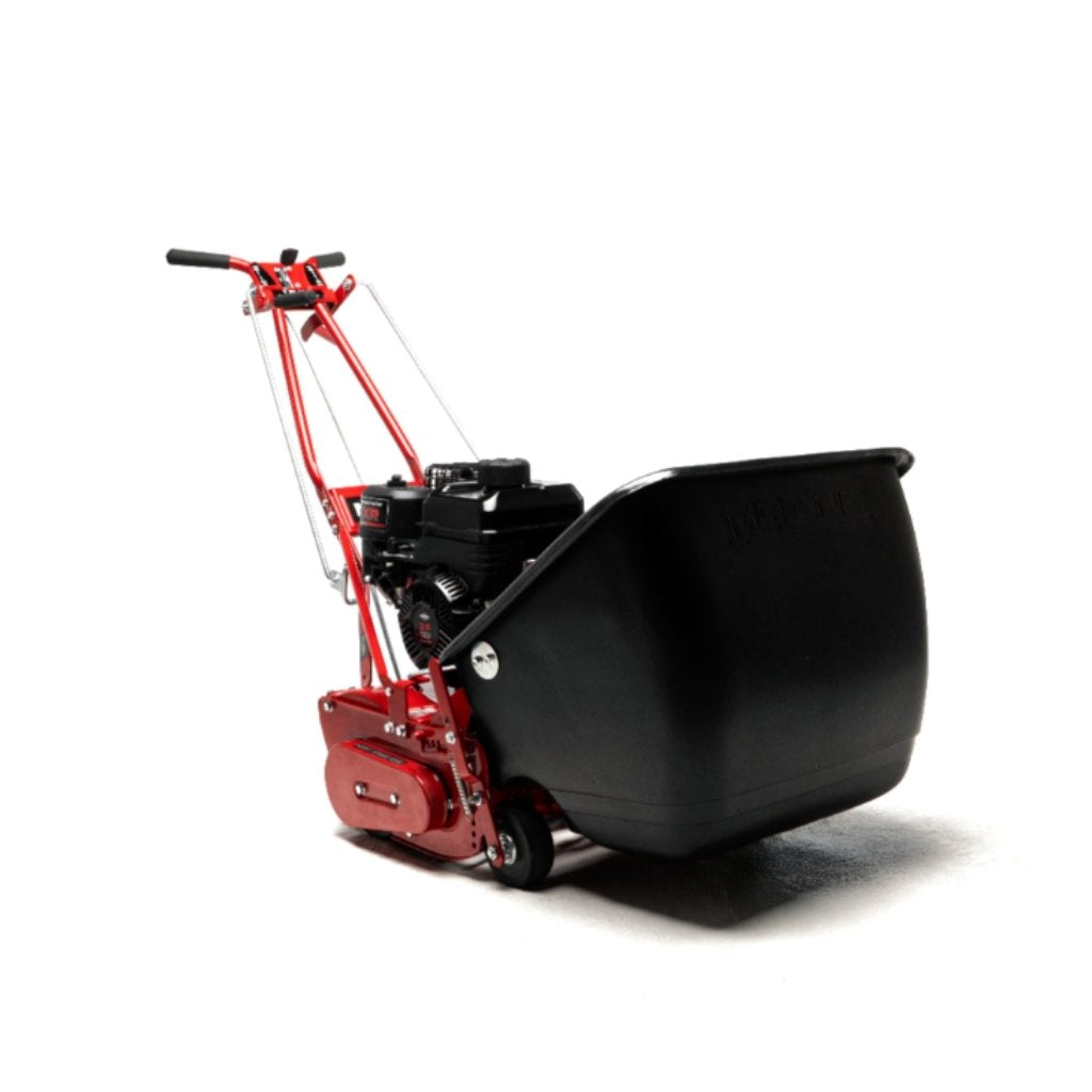 Red and black Mclane 20 in reel lawn mower on a white background