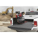 Truck bed with a large northstar 30 gallon air compressor and excavator in the background