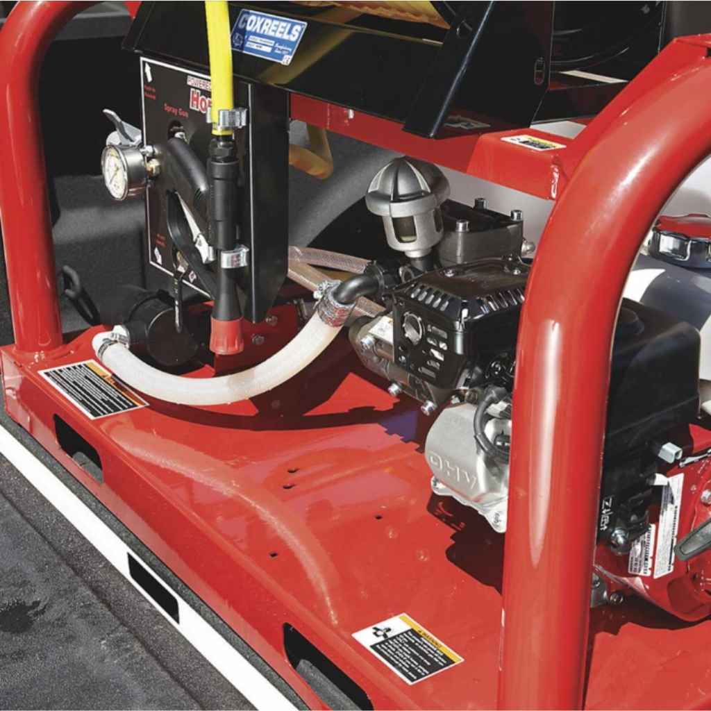 Close-up of a red Northstar 200 gallon skid sprayer engine with visible branding