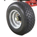 Close-up of a black nortrac pull behind trencher tire with tread pattern on a white background