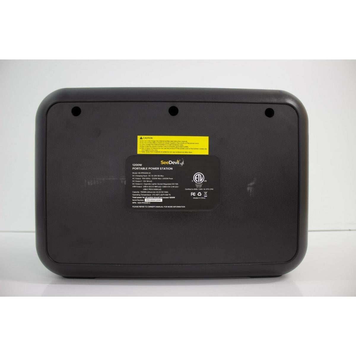 Black seedevil 1200 portable power station with a label on a white background