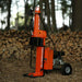 Orange hydraulic superhandy gas 25 ton log splitter with 'SuperHandy' branding in a forest setting.