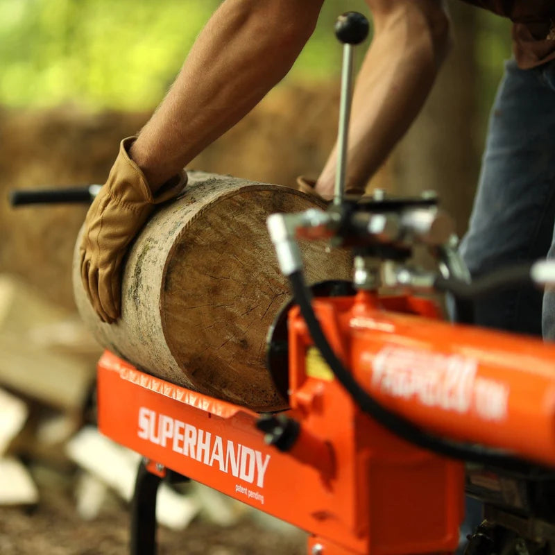 A 25 Ton Gas Log Splitter with a 7HP 209CC engine, colored in orange and black, with a large log placed on its splitting platform. Back view outdoors horizontal position in use.