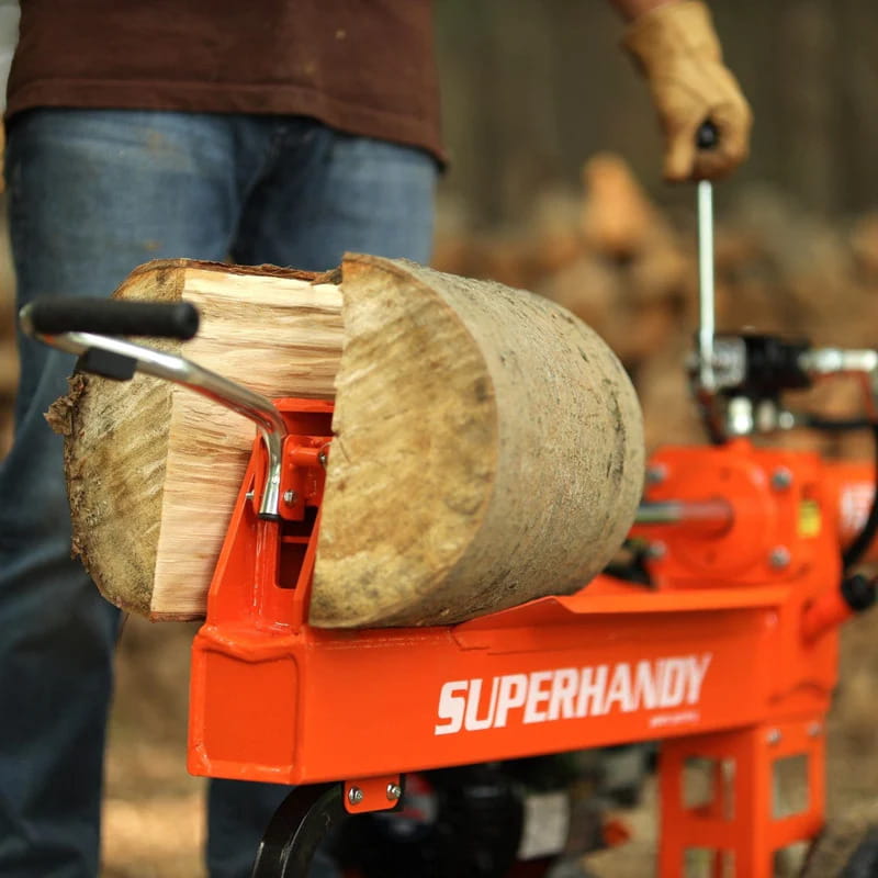 Person using a Superhandy 20 ton gas log splitter with a log in the process.