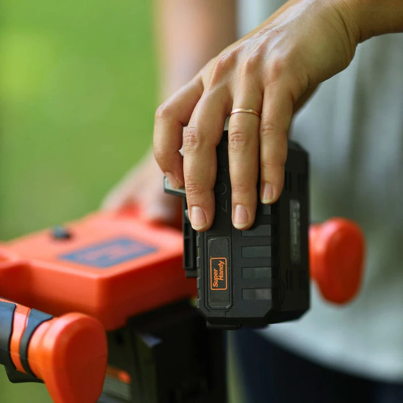 superhandy 20v Electric Earth Auger with a 20V 4Ah battery, featuring an orange and black color scheme, with a auger bit inserted vertically. Battery view outdoors.