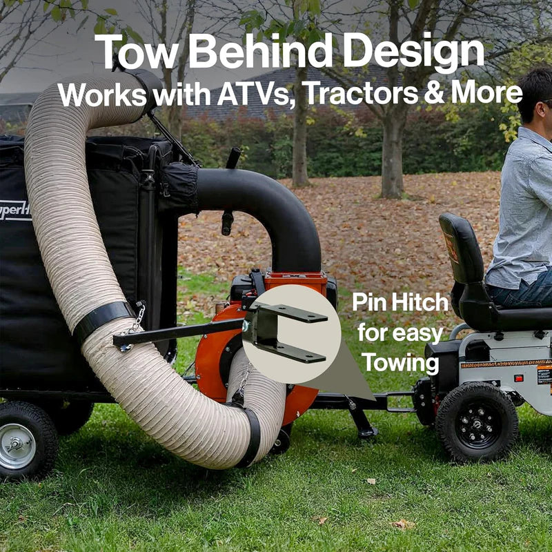 Tow behind design for ATVs and tractors with a person sitting on a trailer.