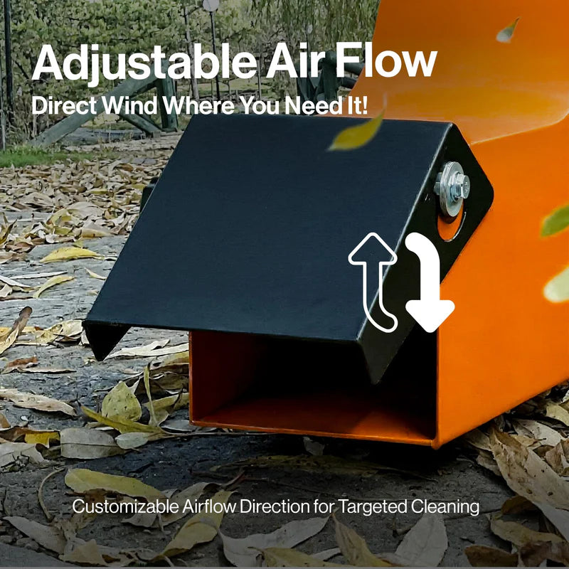 Orange and black leaf blower with adjustable airflow feature on a leaf-covered ground.