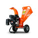 An orange mini wood chipper with a 7HP gas powered engine, equipped with wheels for mobility.