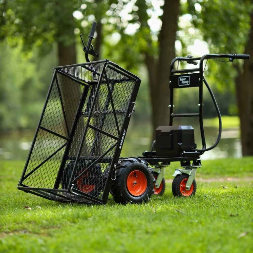 Two black superhandy 48v utility cart with orange wheels on a grassy area with trees in the background