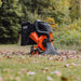 superhandy 3 in 1 wood chipper in a grassy area with trees in the background