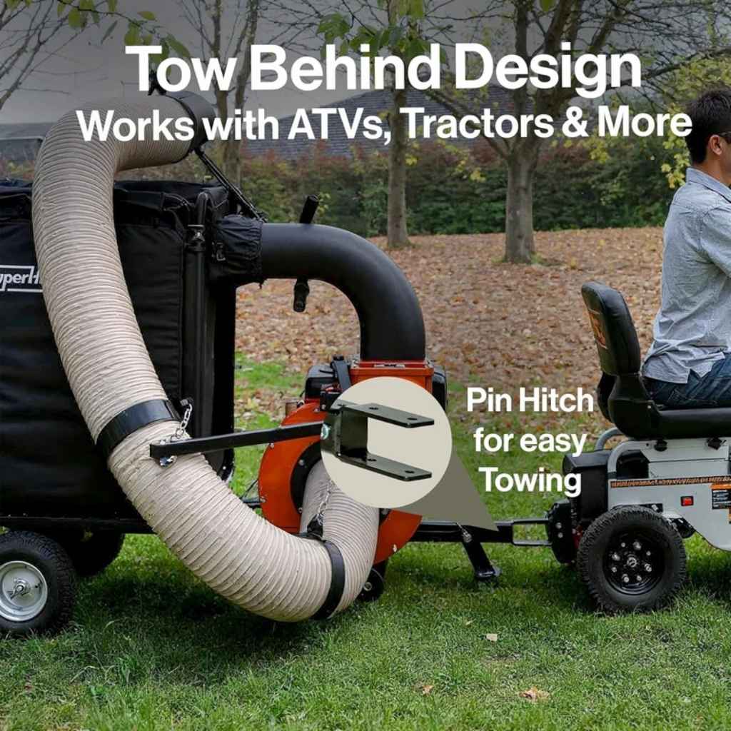 superhandy leaf vacuum 180 gal Tow behind design for ATVs, tractors, and more with a person sitting on a trailer.